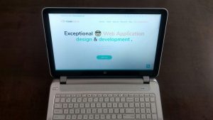 HP laptop displaying the homepage for CodeCarrot